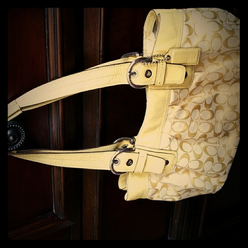 Light yellow Coach handbag